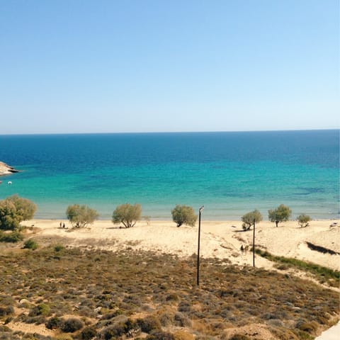 Visit the local sandy beaches – Orfanogisnni Beach isn’t far