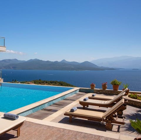 Spend long lazy days soaking up the hot Greek sun poolside