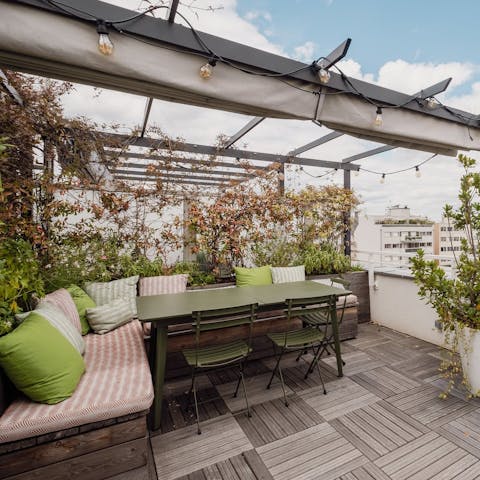 Kick back on the rooftop terrace with a glass of Beaujolais