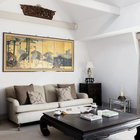 Admire the beautiful Eastern artworks and furnishings around the home