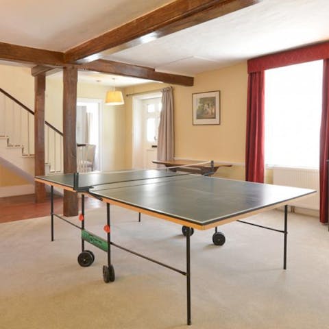 Challenge the group to a table tennis tournament 