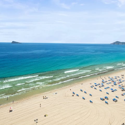 Admire the beach and bay vistas from your Juliet balcony