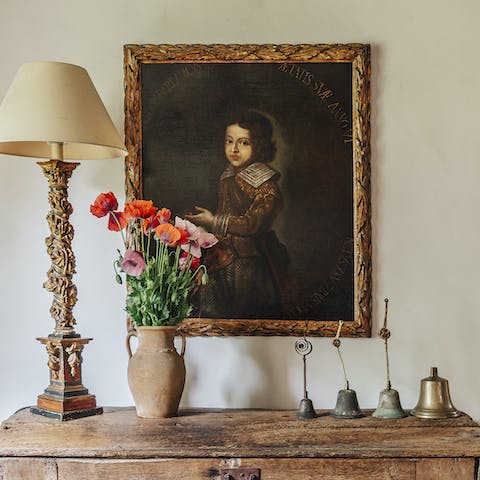 Stare in awe of the breathtaking paintings that adorn the walls aof this home