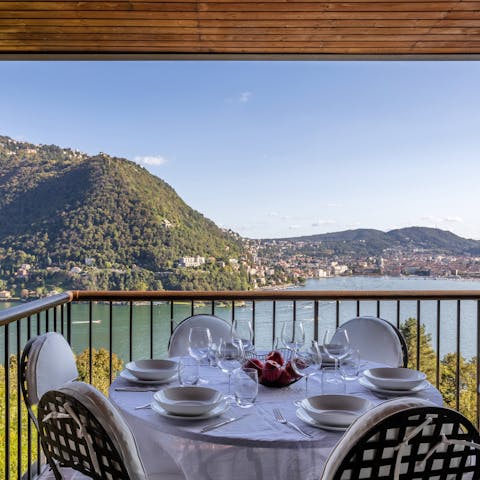 Enjoy dinner on the terrace with views across the lake