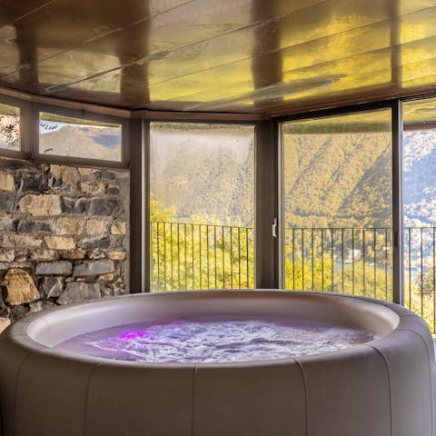 Soak in the hot tub after a busy day exploring