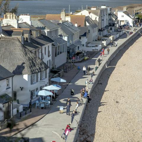 Stroll along the three miles of shingle beaches from the front door of your home