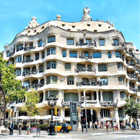 Visit Gaudí's impressive Casa Milà, a twelve-minute walk away