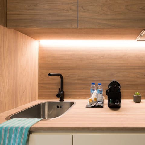 Find everything you need for your stay in the sleek galley kitchen