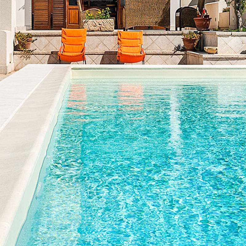 Relax on the loungers before jumping in the pool to beat the Italian heat