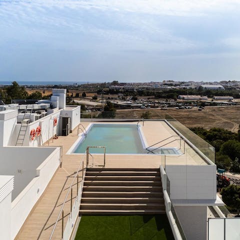 Take in the Mediterranean Sea views from the shared roof terrace