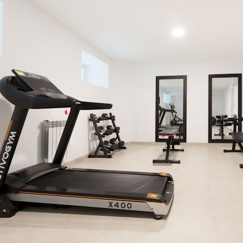 Stay on top of your fitness goals with a workout at the communal gym 