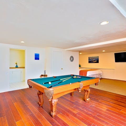 Get a pool tournament going among your fellow guests