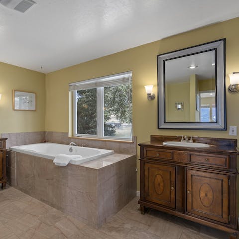 Sink into a luxurious hot bath after a long day outdoors