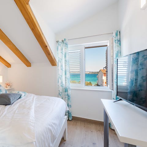 Wake up to view of the crystal clear sea in the bedrooms