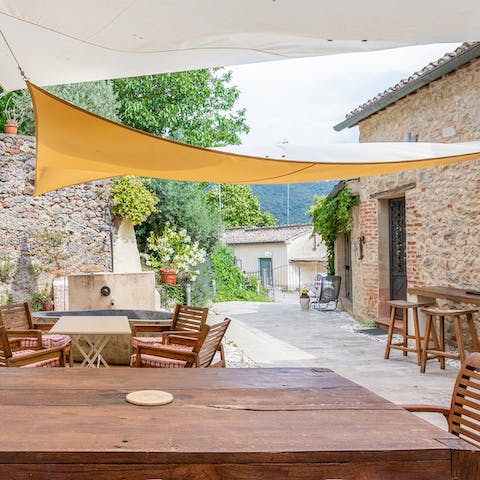 Sunbathe and dine alfresco in the shared courtyard
