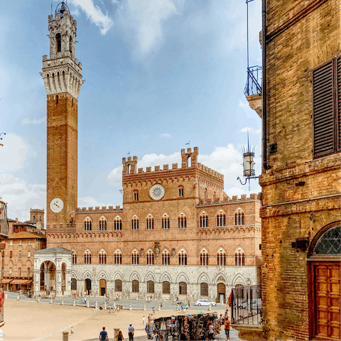 Visit the storied city of Siena, a nineteen-minute drive away