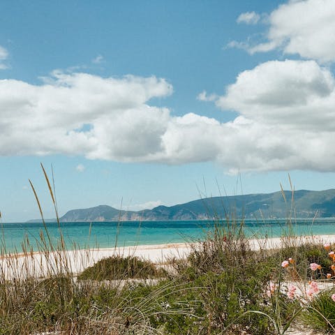 Enjoy incredible views over the sand dunes to the ocean from this home