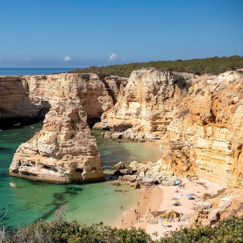 Take daily walks to Praia da Marinha, one of the prettiest beaches in the Algarve