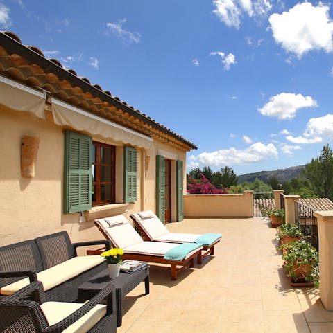 Catch some rays and admire the countryside views from the balcony 