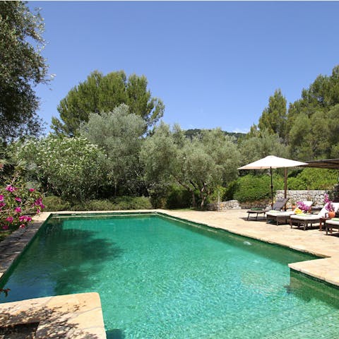 Cool off from the Spanish sun in the emerald green pool