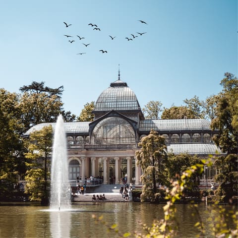 Walk toward El Retiro Park for a refreshing afternoon stroll