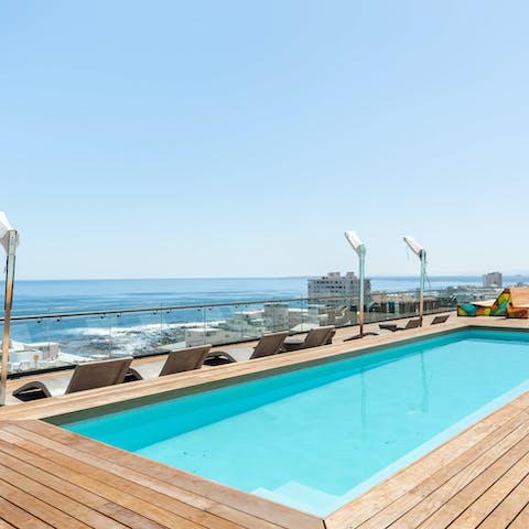 Take in the ocean views from the shared roof terrace and pool