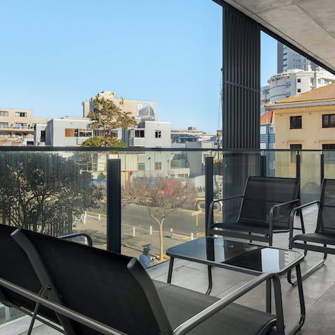 Relax in the warm South African air on the private balcony