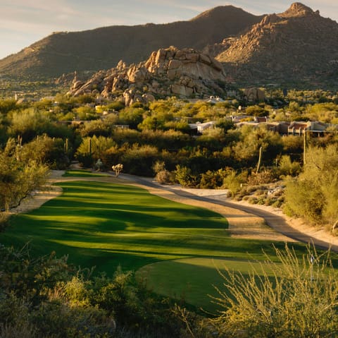 Play some golf at Paradise Valley Country Club, right across the street