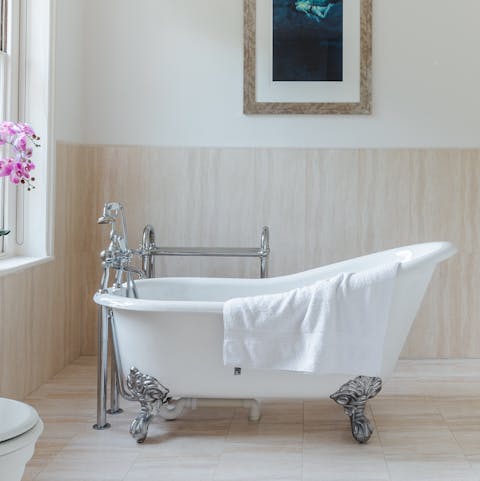 Soak away your cares in the elegant clawfoot tub