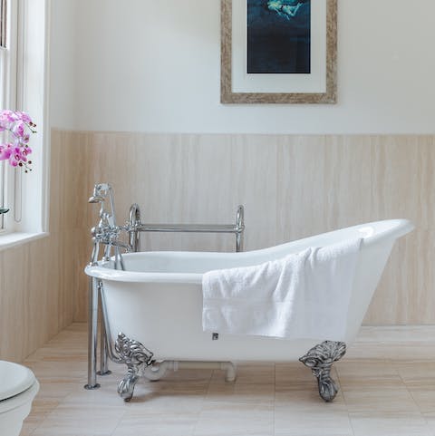 Soak away your cares in the elegant clawfoot tub