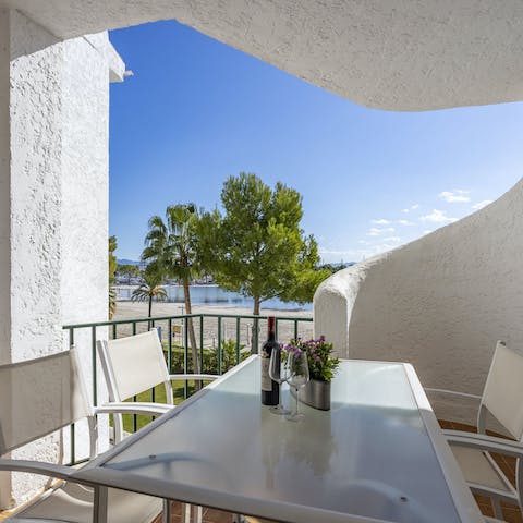 Sip on sundowners on your balcony, the perfect place to watch the sunset over the sea