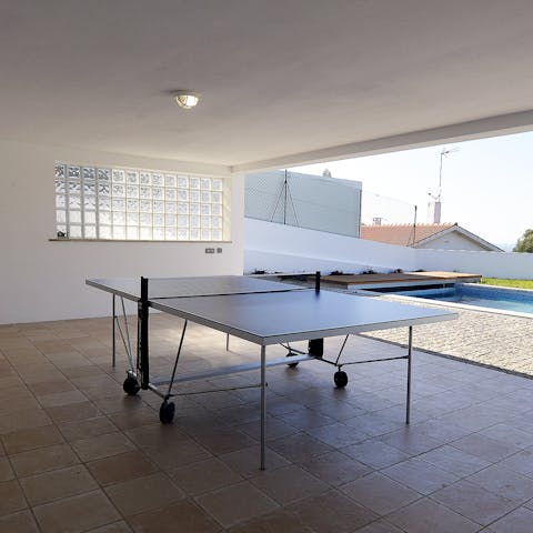 Get competitive with a game of ping-pong on the covered terrace