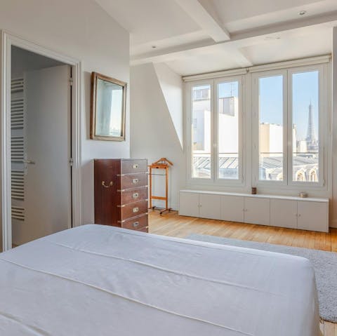 Wake up to Eiffel Tower views in the cosy main suite