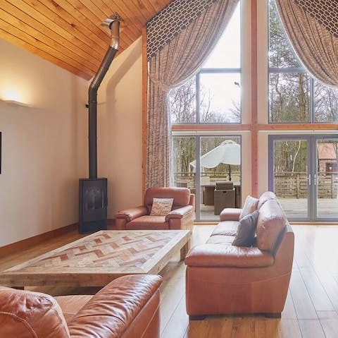 Cosy up by the living room's wood-burning stove