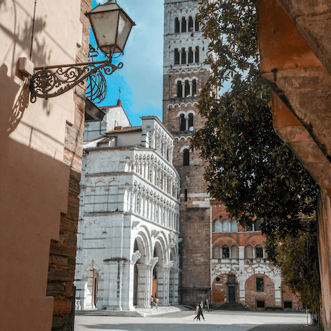 Meander through Lucca's medieval streets leading to the nearby Duomo