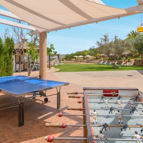 Get competitive around the foosball and ping pong tables