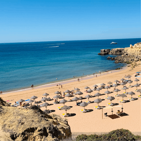 Grab a spot on the golden beach at the Calheta resort, just 3km away