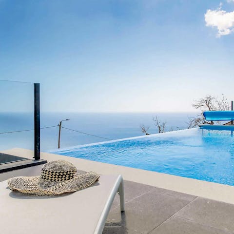 Take in the uninterrupted sea view from the infinity pool