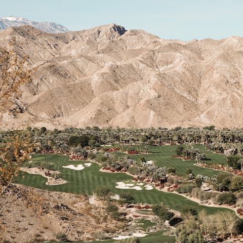 Put your skills to the test at Palm Springs' famed golf courses, just an eight-minute drive away