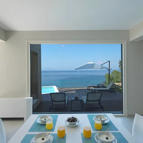 Enjoy an indoor breakfast with a sea view