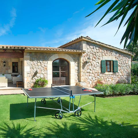 Get competitive and play a game of table tennis in the garden