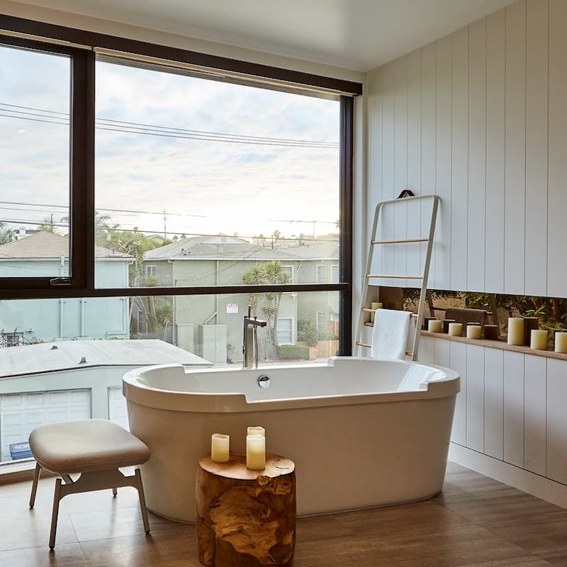 Light some candles and sink into the deep bathtub
