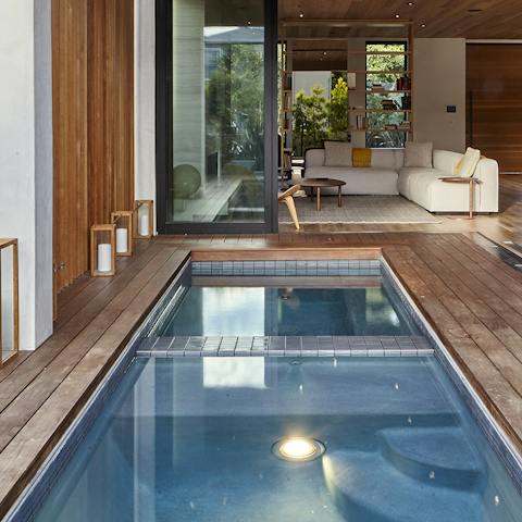 Take a refreshing dip in the indoor-outdoor pool