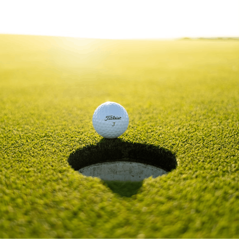 Shoot some holes in the three-hole putting green under the hot desert sun