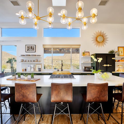 Sit at the twelve-foot island in the gourmet kitchen, surrounded by large windows to let in natural light