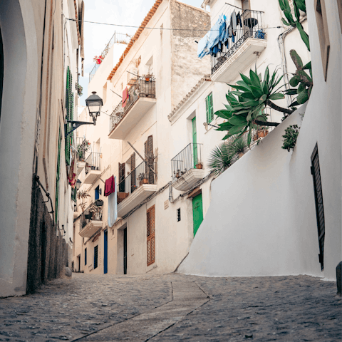 Dive into the historic streets of Ibiza Old Town, just a ten-minute drive away