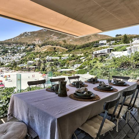 Enjoy breakfast on the deck before strolling to the beach