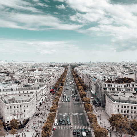 Travel seven stops on the metro to Champs-Élysées