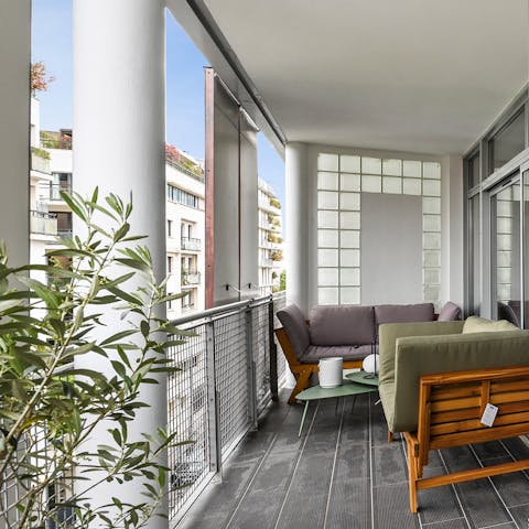 Chill out on the balcony with a glass of wine after a day of exploring