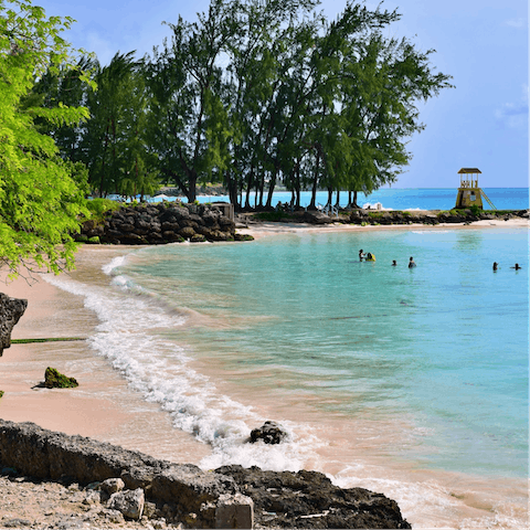 Paddle in the clear shallows of the beach – it's just a few steps away